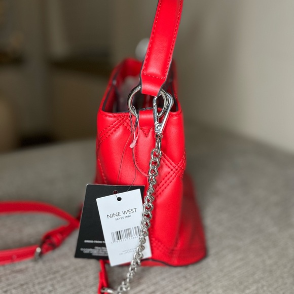 Red NineWest double-handled wallet to wear it two ways plus it's also adjustable - Picture 7 of 13